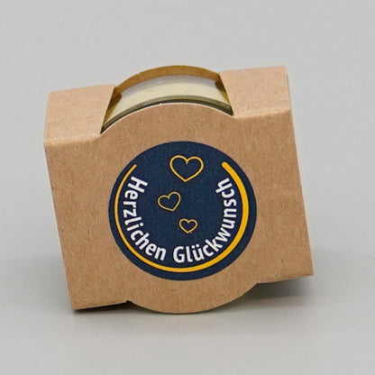 verpacktes Teelicht mit Aufschrift Herzlichen Glückwunsch