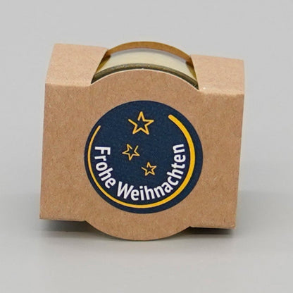 verpacktes Teelicht mit Aufschrift Frohe Weihnachten